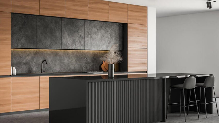 Cozinha moderna que conta com uma bancada em ilha revestida com Quartzo Stone de tom escuro.